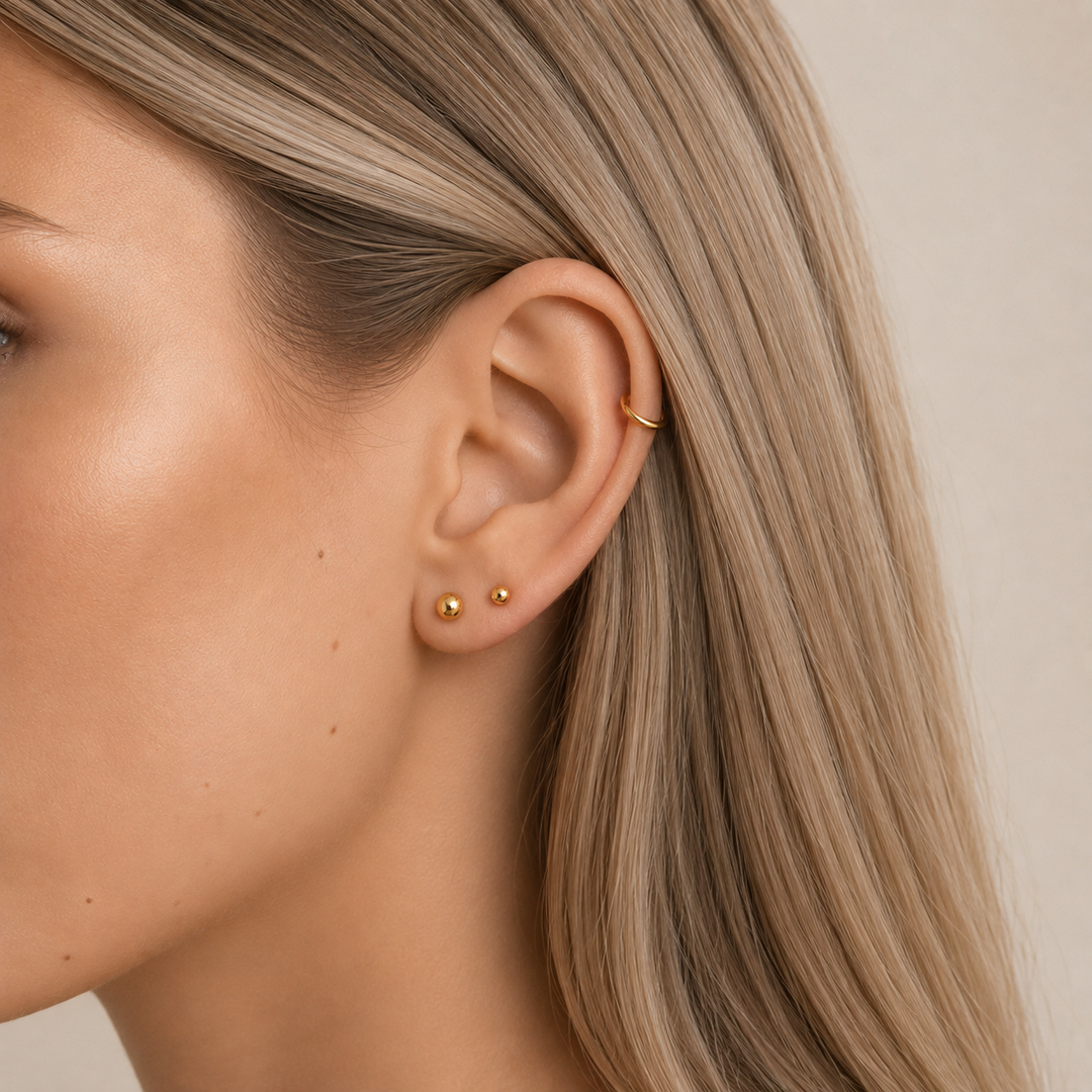 Close-up of 18K Solid Gold Aurelia Petite Gold Ball stud earring - fine jewellery by Margot Georgia