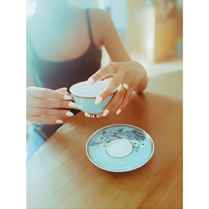 Model wearing the 14K Gold Vermeil Dome Elysse ring in a lifestyle shot