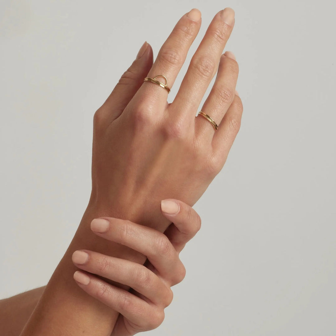 14K Gold Filled Arc and Noa stacking rings on hand