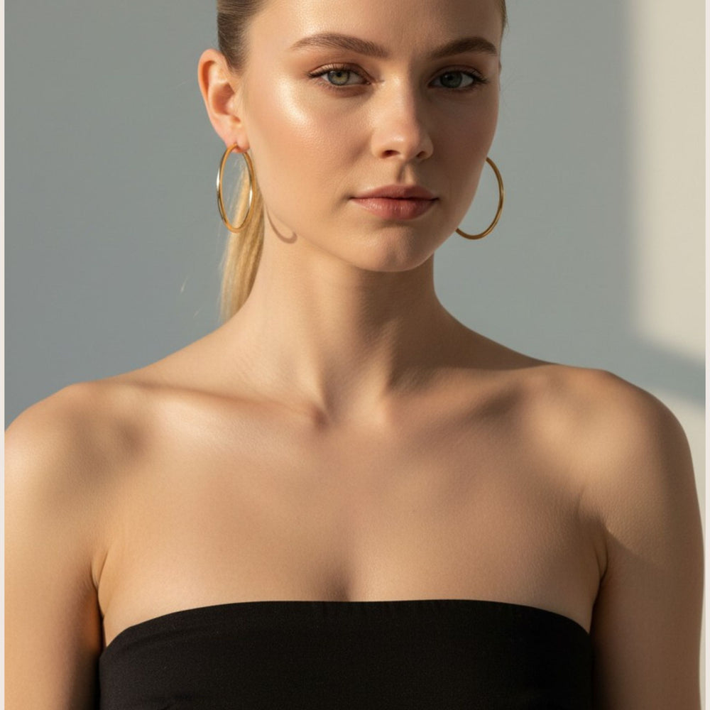 Woman wearing 14K Gold Filled Carmela hoop earrings - demi-fine jewellery by Margot Georgia