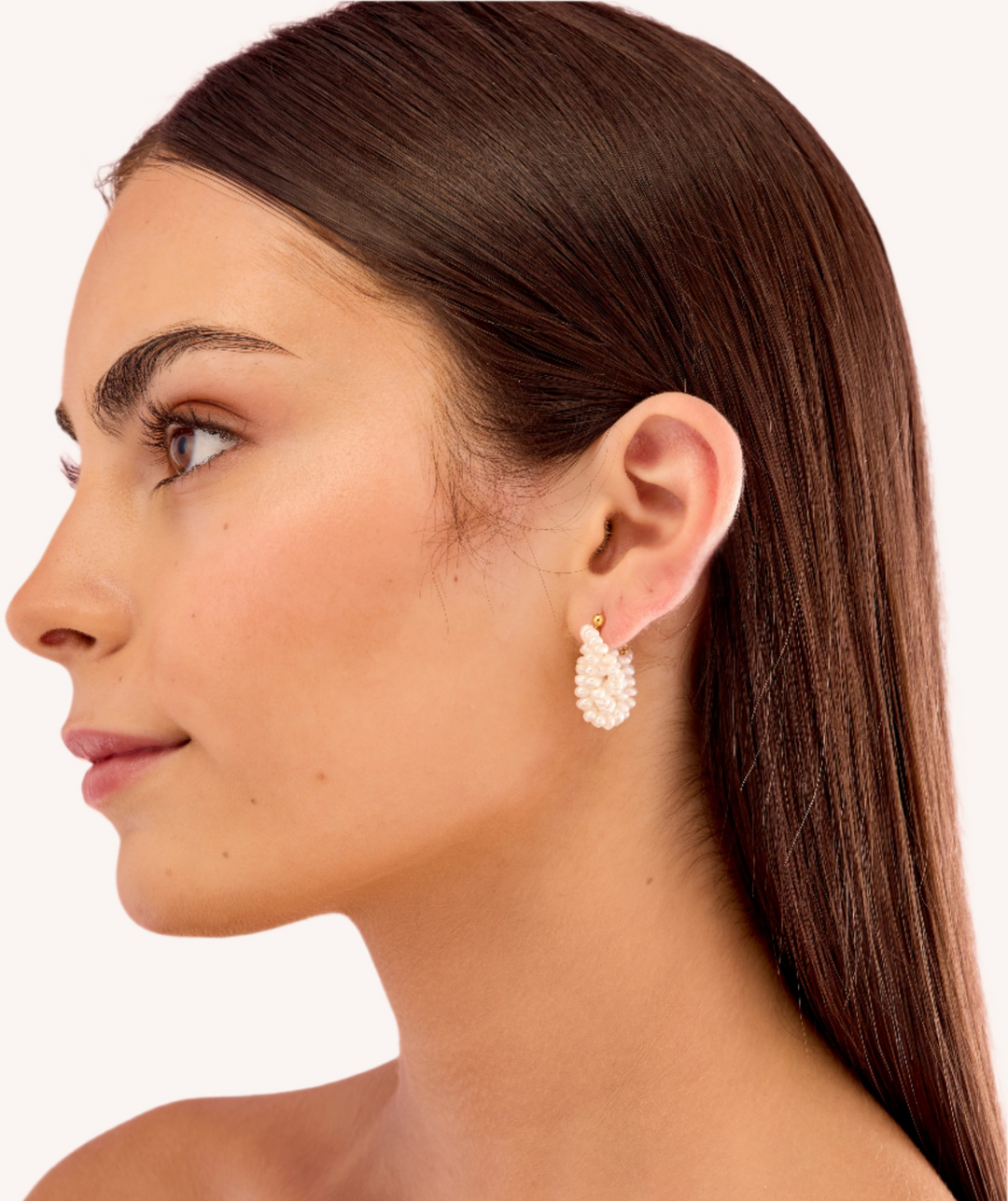 Close-up of a woman wearing 14K Gold Filled Fleur de Perle earrings - demi-fine jewellery by Margot Georgia