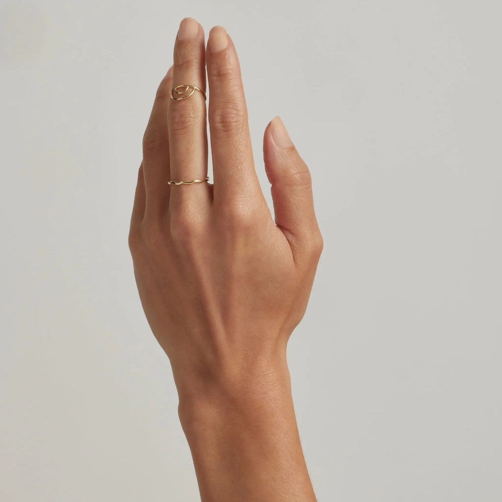 Hand wearing 14K Gold Filled Iridiana and Gal stacking rings - demi-fine jewellery by Margot Georgia