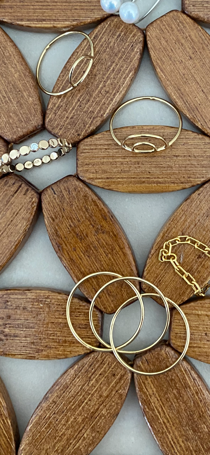 Display of 14K Gold Filled rings including Iris, Arc, Iridiana and Interlocking - demi-fine jewellery by Margot Georgia