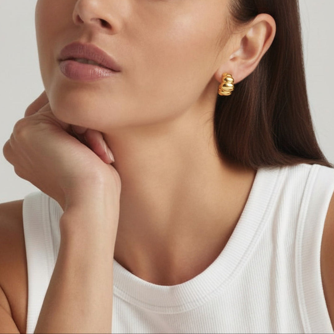 Woman wearing 18K Gold Plated Croissant  Dome drop earrings - demi-fine jewellery by Margot Georgia
