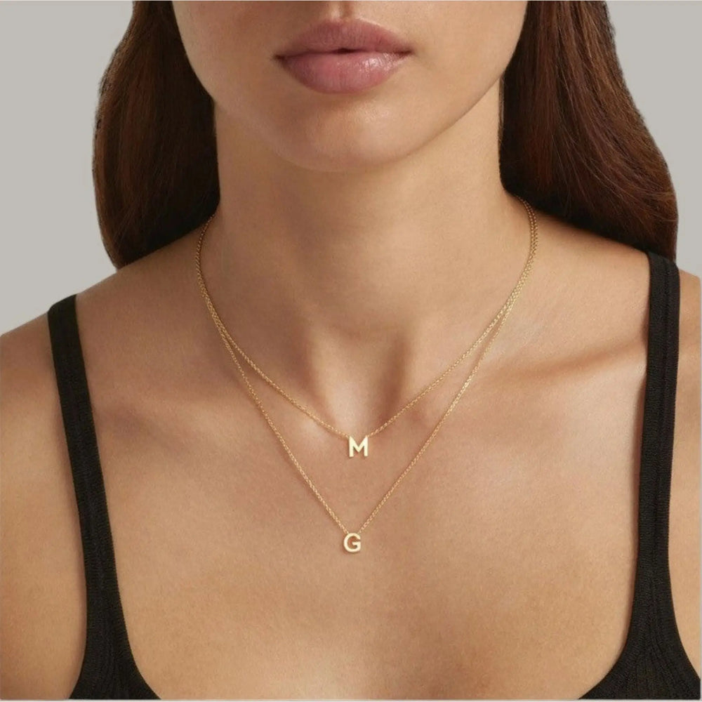 18K Gold Plated Letter necklace showcasing 'M' and 'G' - demi-fine jewellery by Margot Georgia