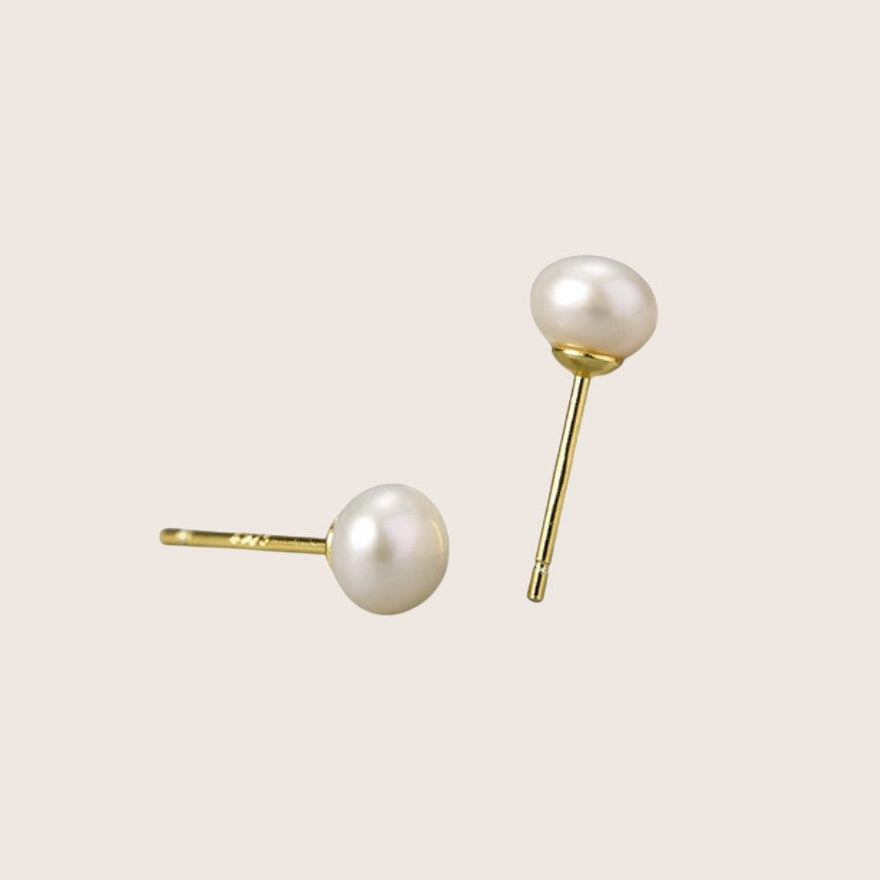 Pair of 18K gold plated Lula pearl stud earrings in white - demi-fine jewellery by Margot Georgia