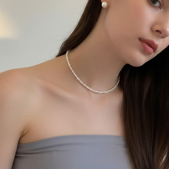 Model wearing 18K Gold Plated Selena Oversized Freshwater pearl studs - demi-fine jewellery by Margot Georgia
