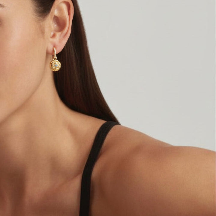 Close-up of woman wearing 18K Gold Plated Vintage Evil Eye hoop earrings - demi-fine jewellery by Margot Georgia
