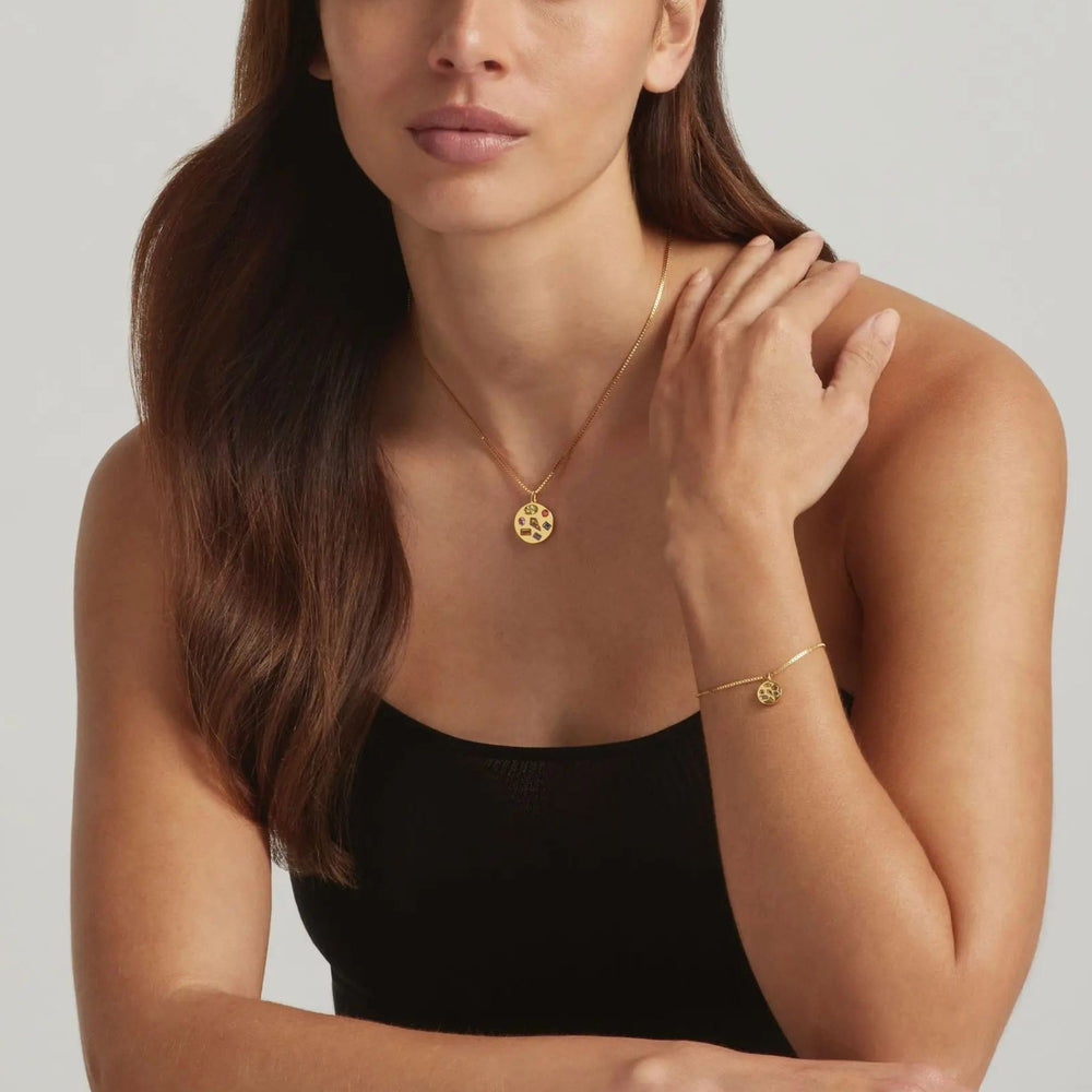 Woman wearing the 18K Gold Vermeil Candy Luxe necklace and bracelet set - demi-fine jewellery by Margot Georgia