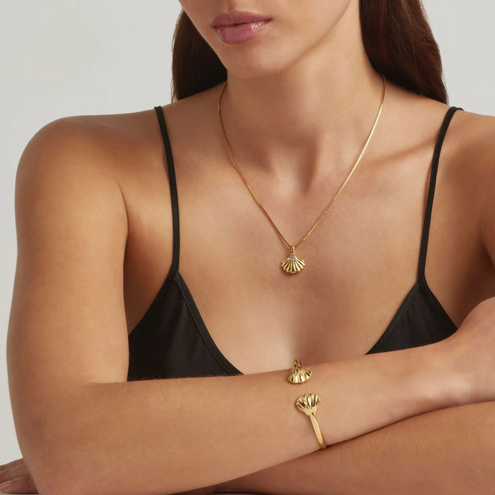 18K Gold Vermeil Oyster of Nerida cuff bangle and Margalo Oyster-shaped pendant necklace on model - demi-fine jewellery by Margot Georgia