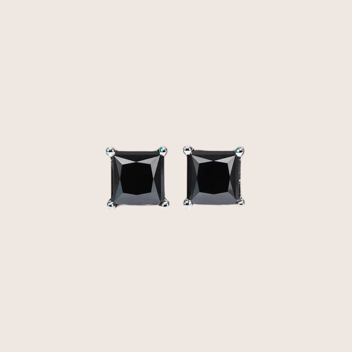 Front view of 18K White Gold Diamante Moissanite stud earrings in black size 2 CTTW