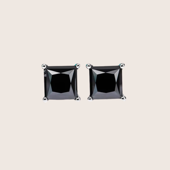 Front view of 18K White Gold Diamante Moissanite stud earrings in black size 4 CTTW