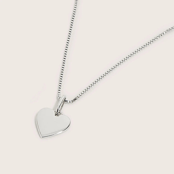 Close-up of 925 Sterling Silver Kordelia Engravable Heart pendant necklace - demi-fine jewellery by Margot Georgia