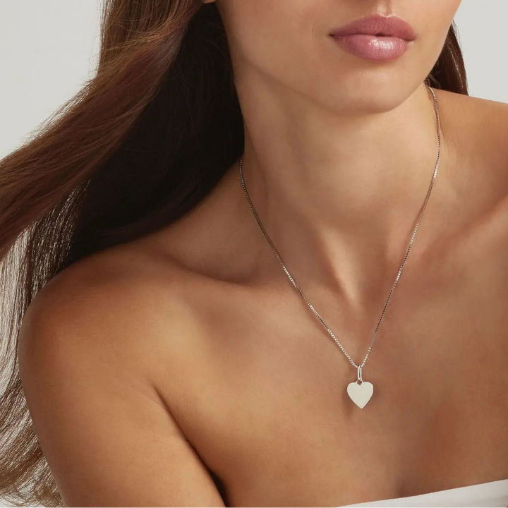 Woman wearing 925 Sterling Silver Kordelia Engravable Heart pendant necklace - demi-fine jewellery by Margot Georgia