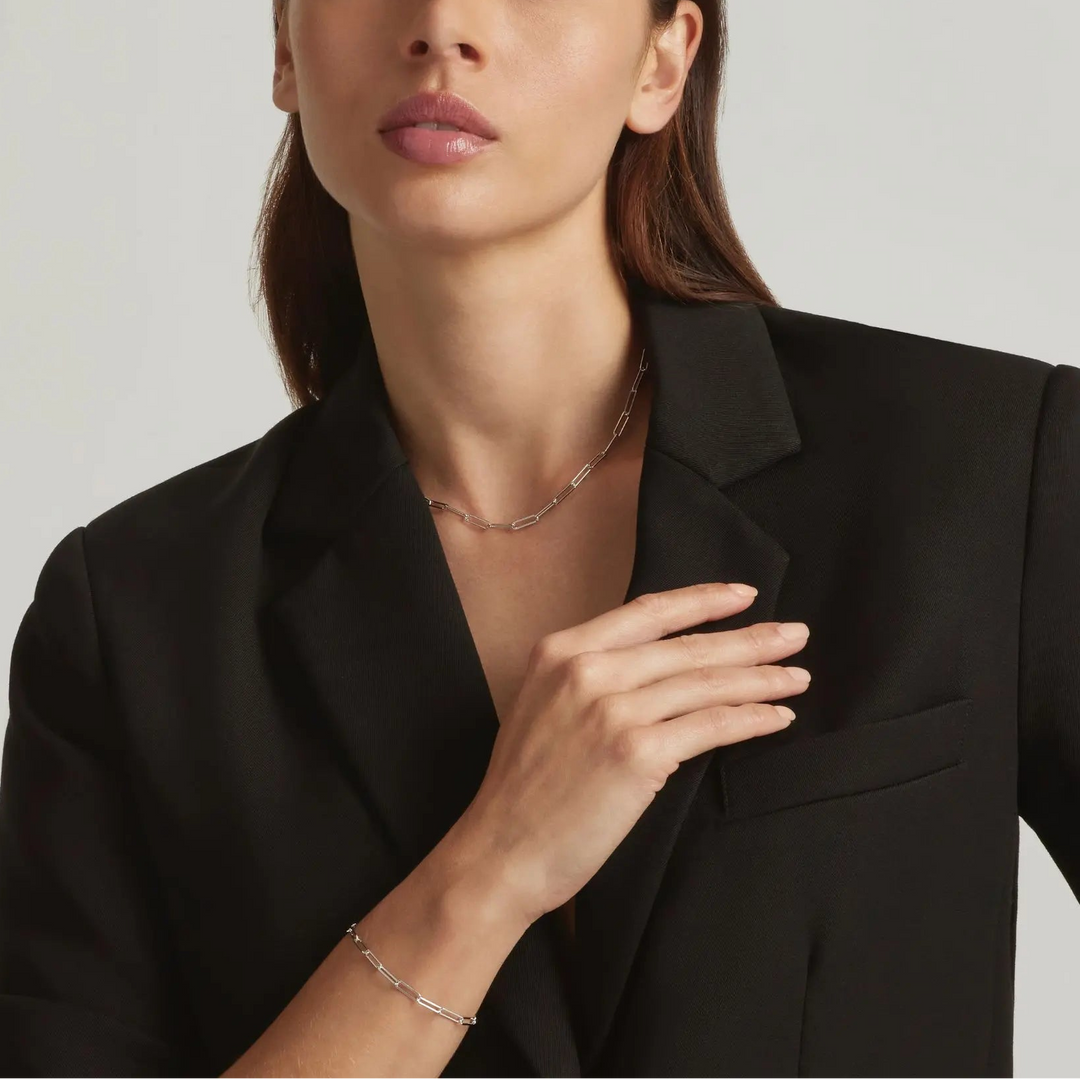 Woman wearing 925 Sterling Silver Rebekka paperclip necklace and bracelet set - demi-fine jewellery by Margot Georgia