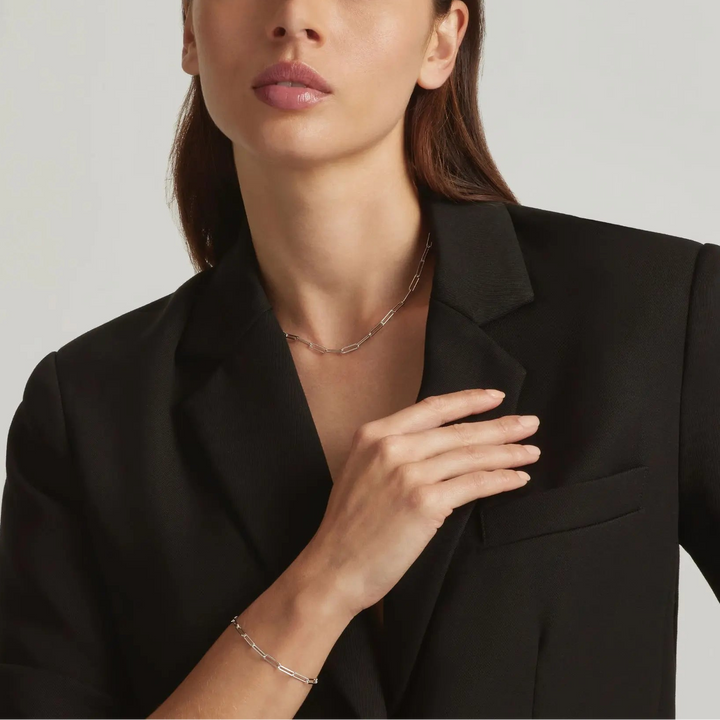 Woman wearing 925 Sterling Silver Rebekka paperclip necklace and bracelet set - demi-fine jewellery by Margot Georgia