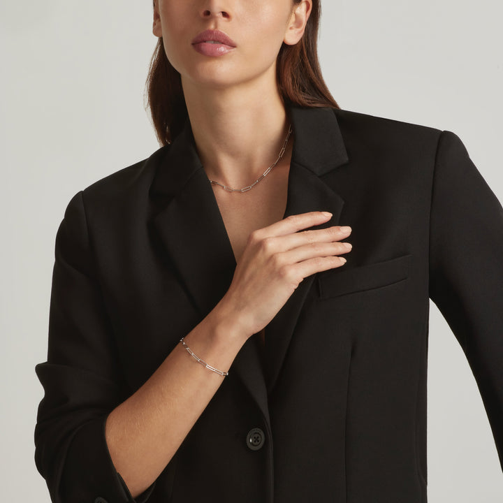 Woman wearing 925 Sterling Silver Rebekka paperclip necklace and bracelet set - demi-fine jewellery by Margot Georgia