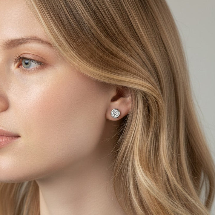 Female model wearing 925 Sterling Silver Tamako Moissanite stude earrings - demi-fine jewellery by Margot Georgia