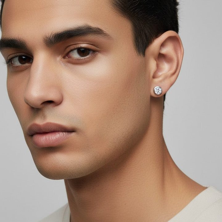 Man wearing 925 Sterling Silver Tamako Moissanite stud earrings - demi-fine jewellery by Margot Georgia