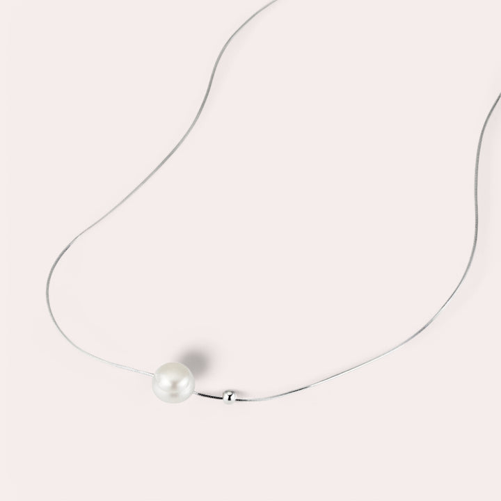 A 925 sterling silver necklace with a single freshwater pearl pendant, displayed against a white background.